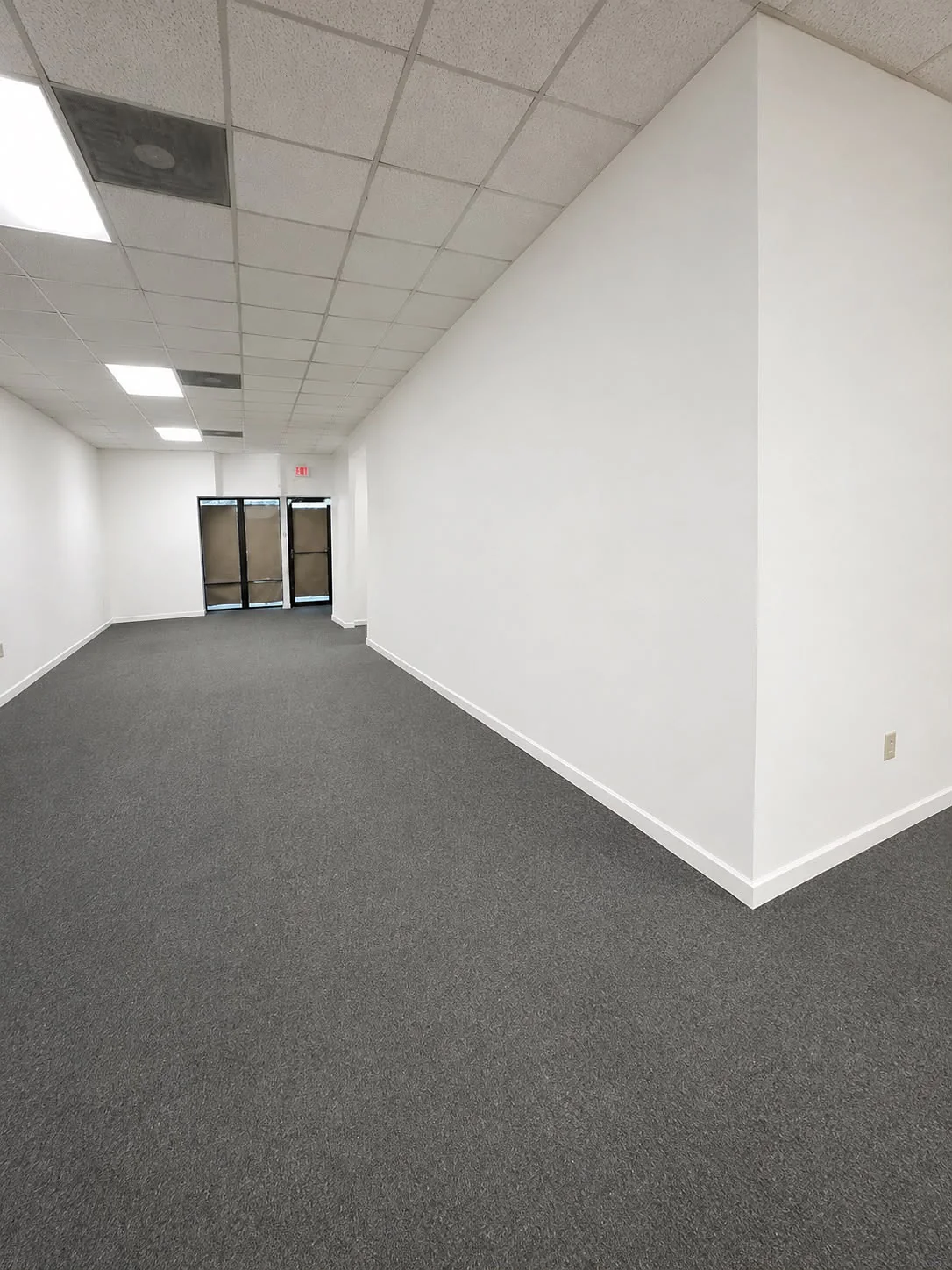 Finished drywall walls in a commercial space, ready for use