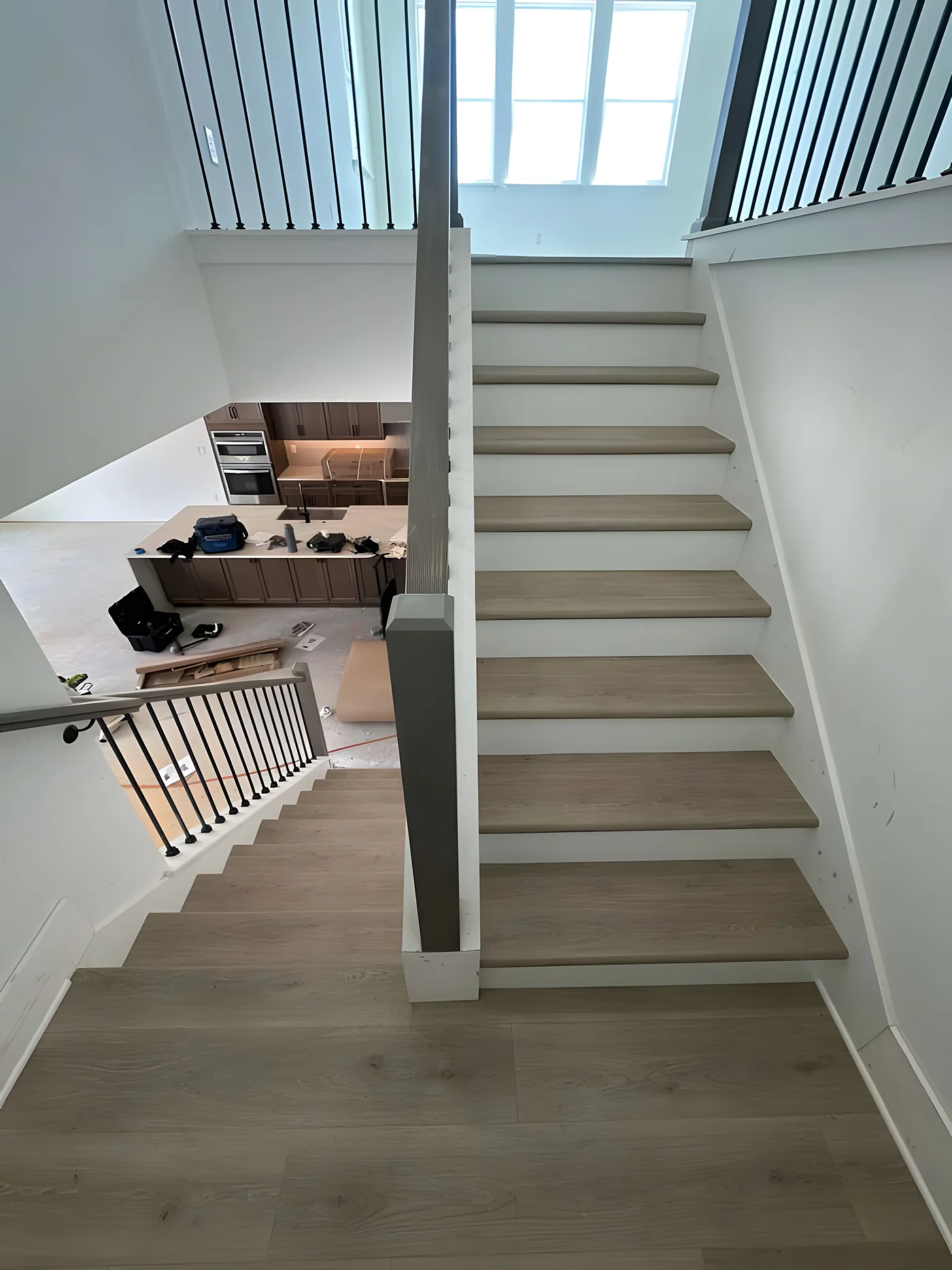 Staircase with new wood-look treads and white risers