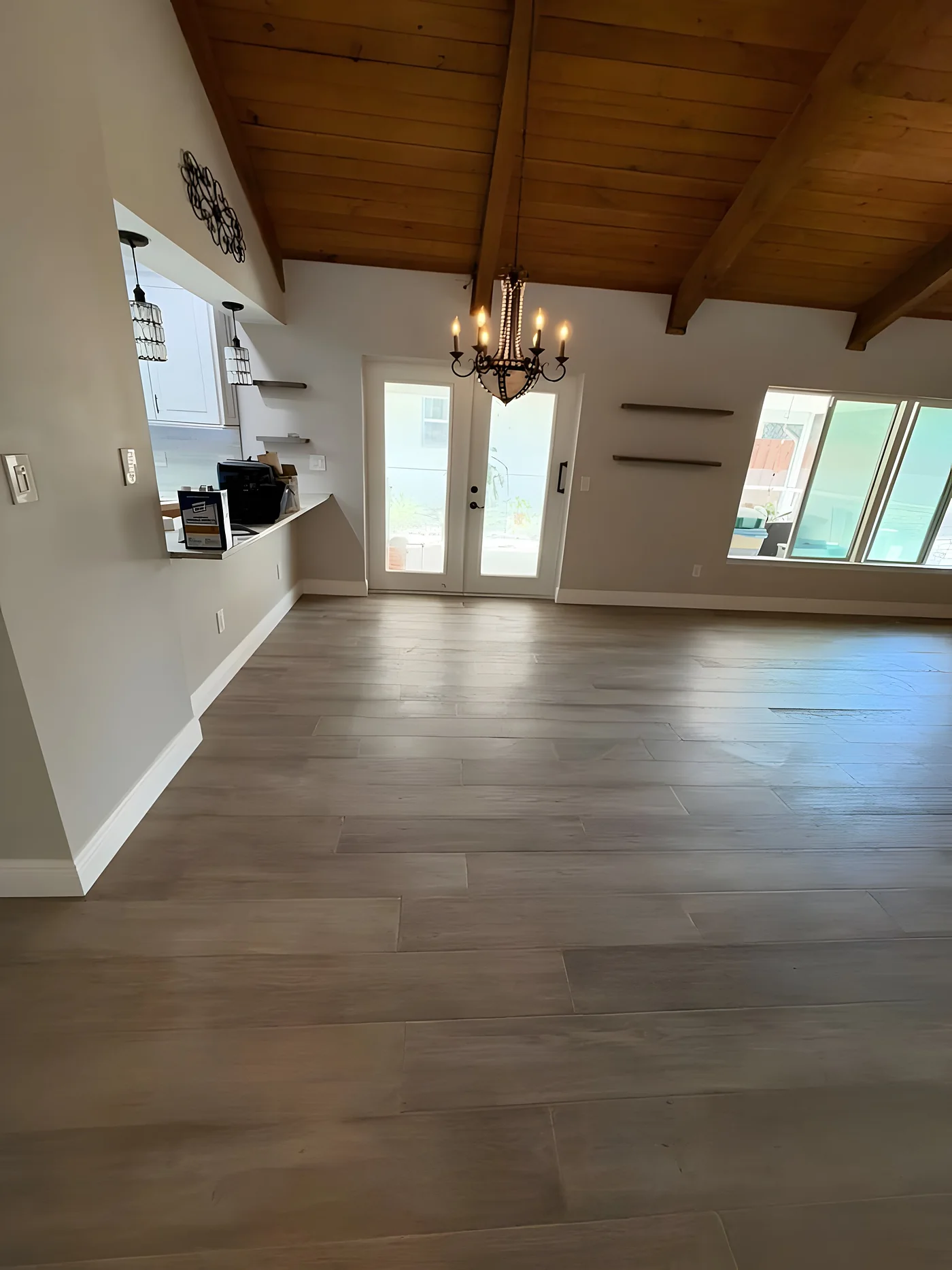 Wood-look plank flooring in a great room with vaulted ceiling